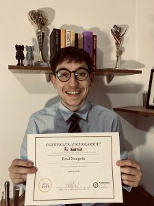 Raul Neagota, winner of the 2022 ITN Scholarship Competition holding his Certificate. He is set to enjoy her USA internship with all $3,825 covered.